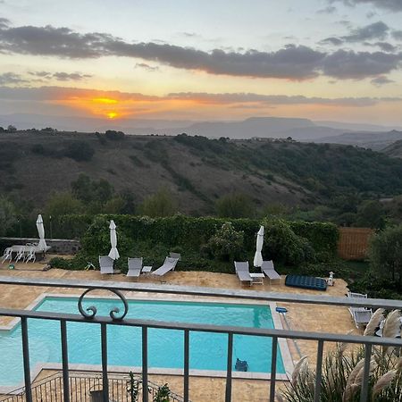 Domus La Roccia Hotel Pozzomaggiore Bagian luar foto