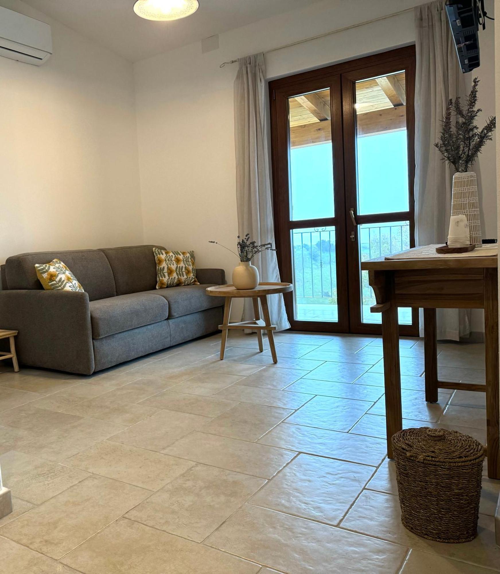 Domus La Roccia Hotel Pozzomaggiore Bagian luar foto