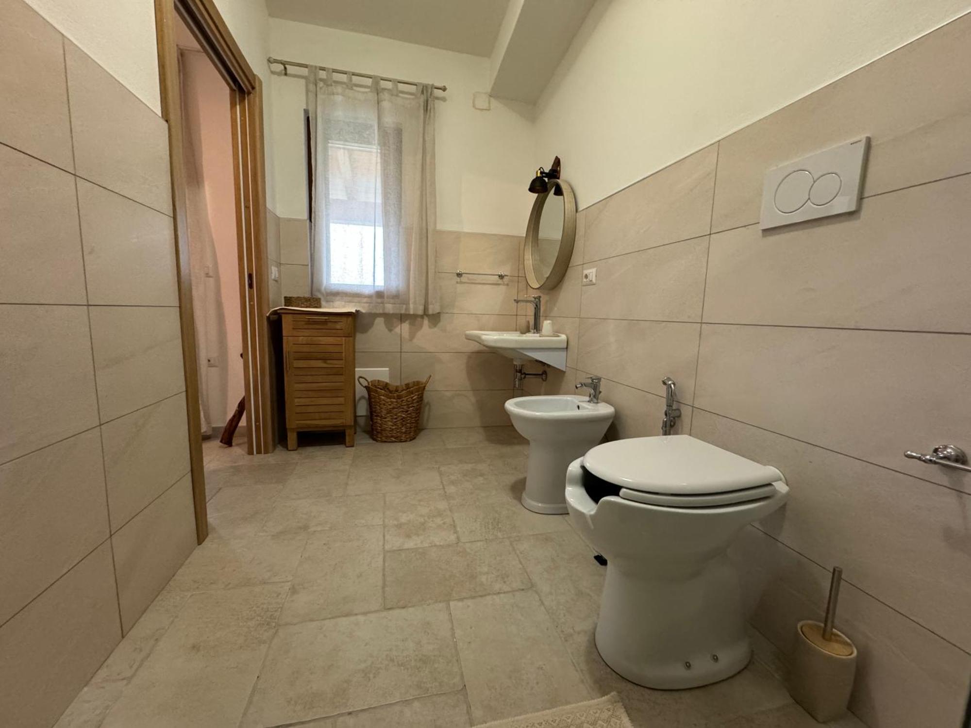 Domus La Roccia Hotel Pozzomaggiore Bagian luar foto