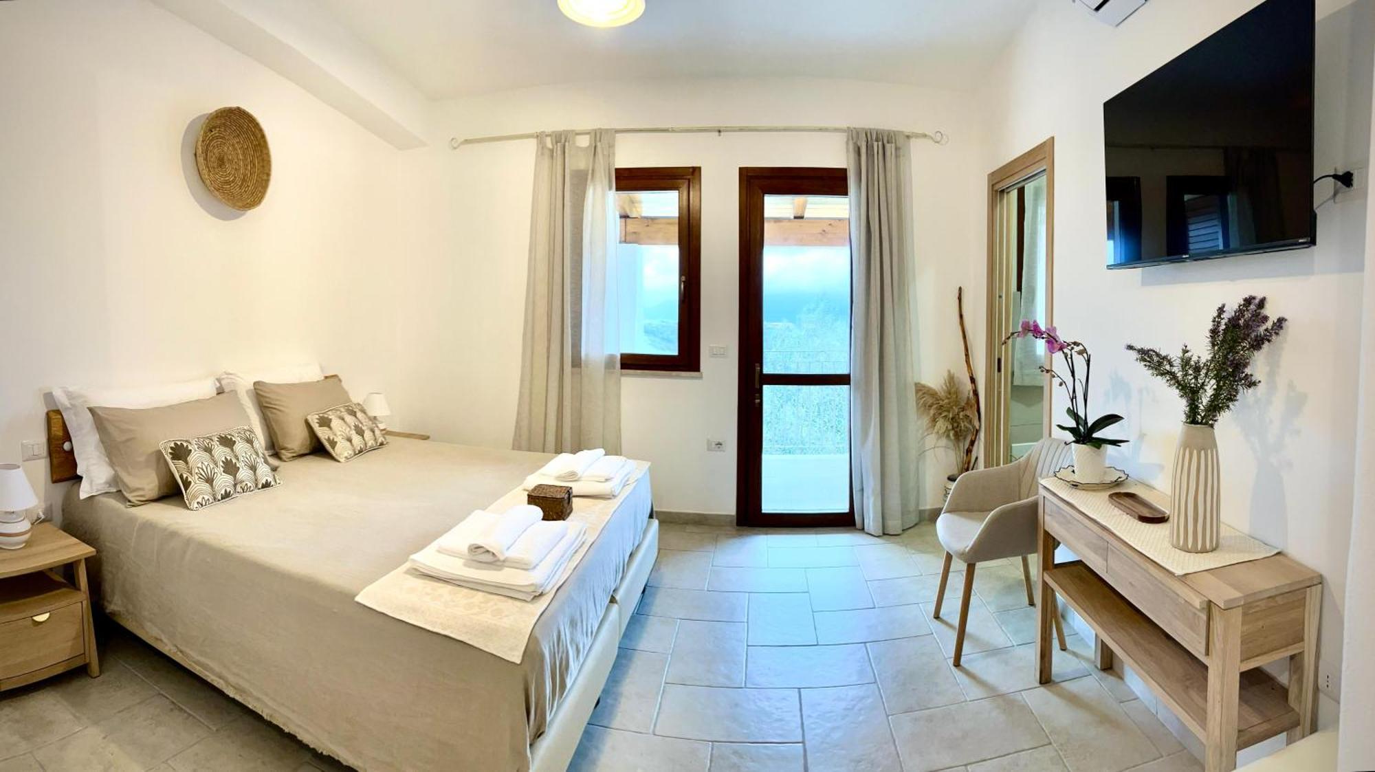 Domus La Roccia Hotel Pozzomaggiore Bagian luar foto